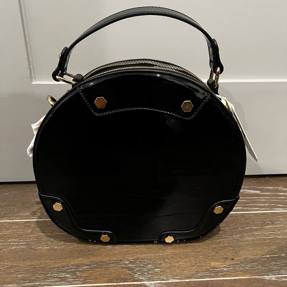 Black Round Handbag with Gold Accents
